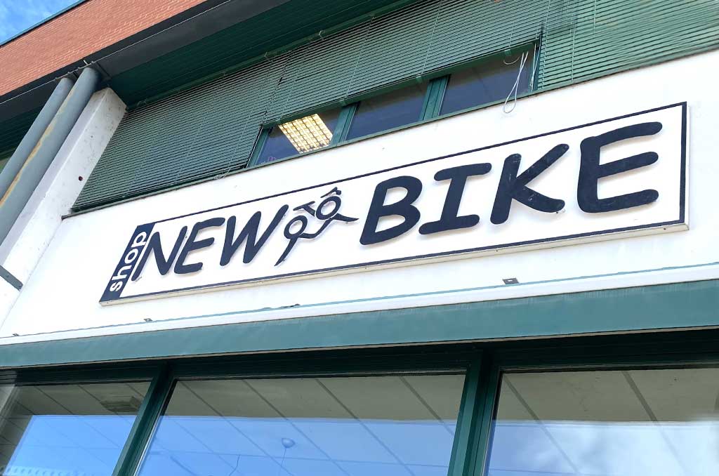 Banner_chi_siamo_negozio_newbike_logo